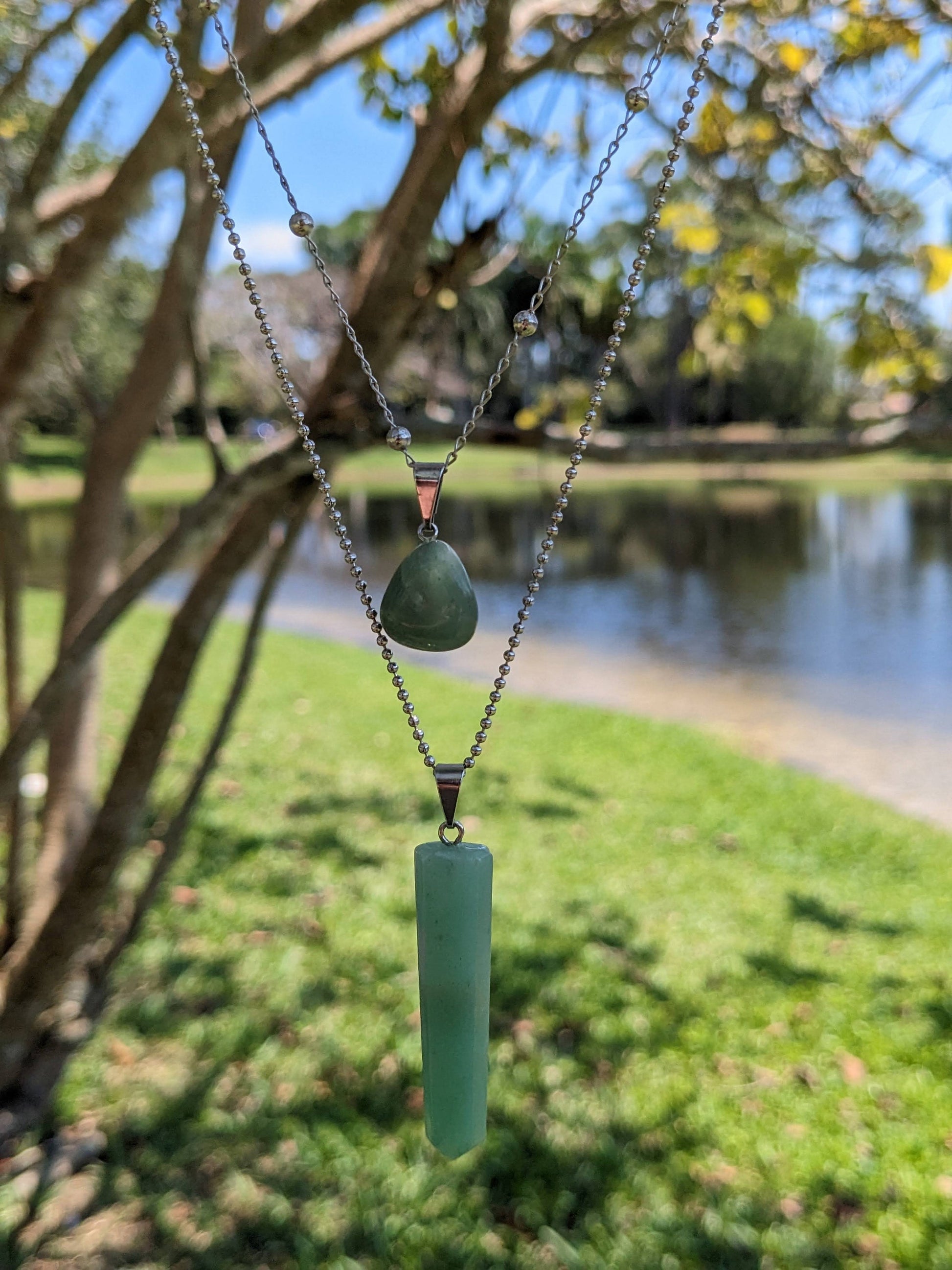 Dual Dimensions Necklace available in Brazilian aventurine or clear quartz β featuring a tumbled stone and a crystal point β Mother Mystique Jewelry