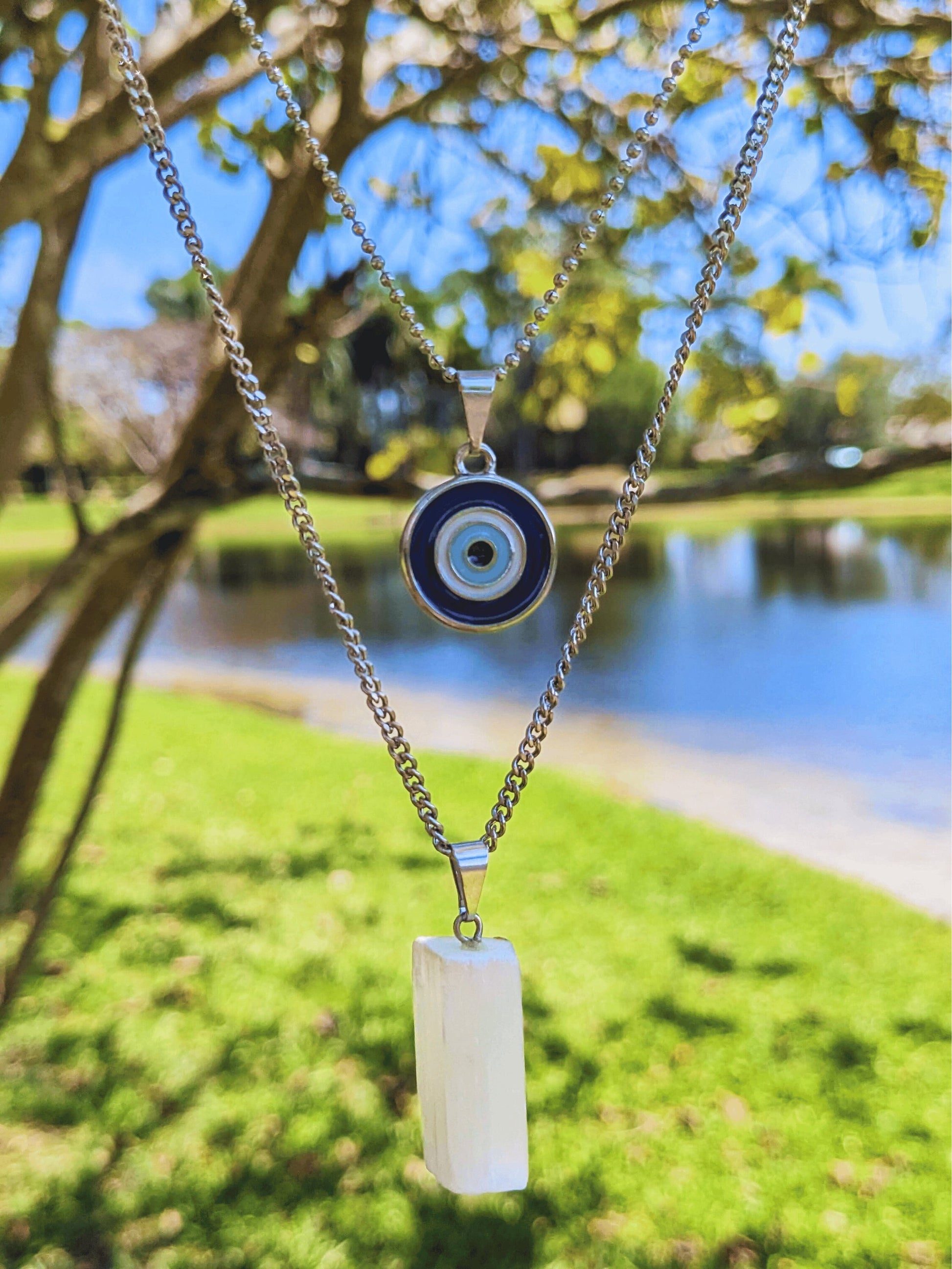 Double-Layered Necklace with evil eye charm and raw Brazilian selenite pendant โ Mother Mystique Jewelry