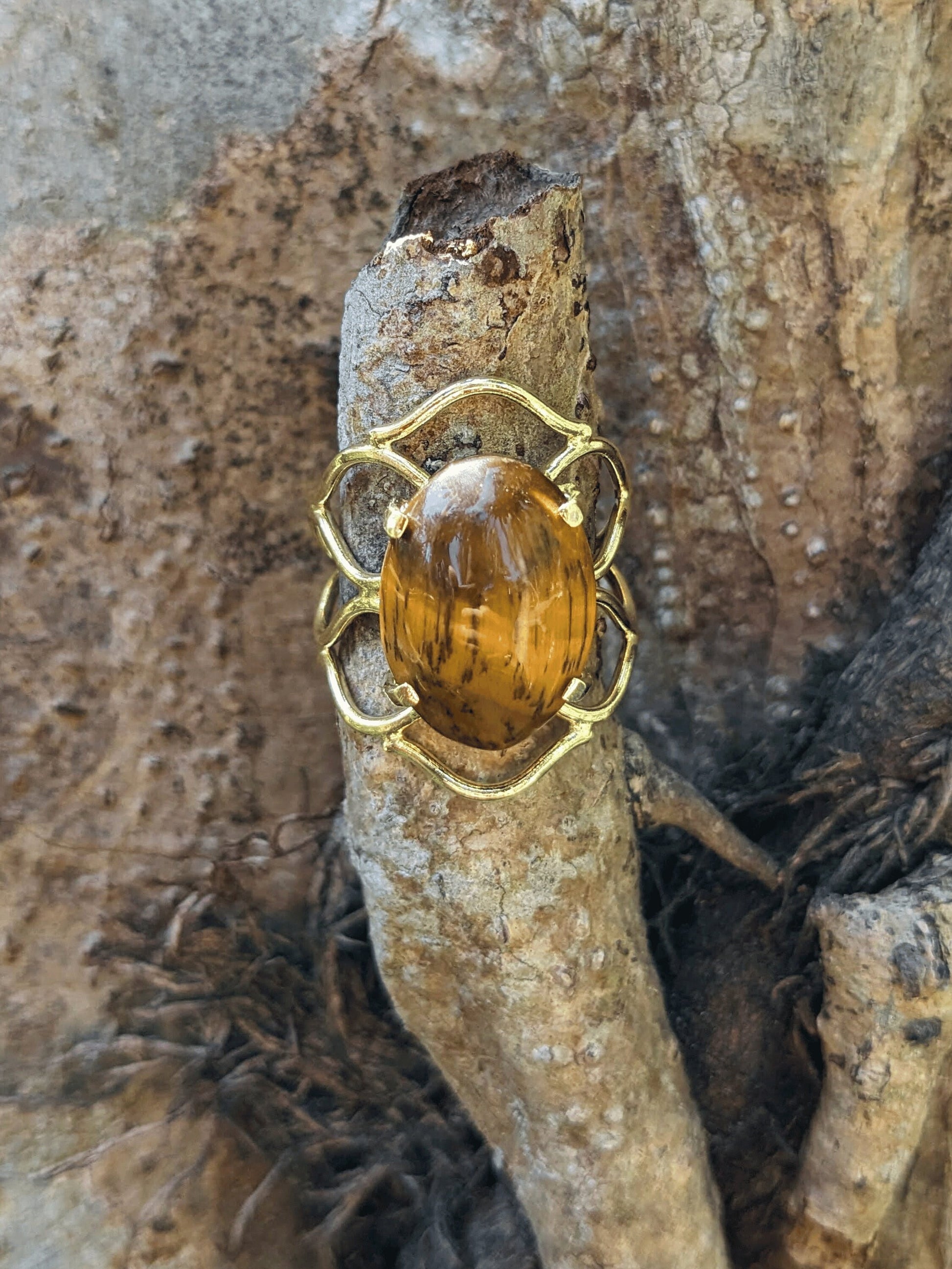 Nature’s Braid Ring with gold-toned braided band and natural Brazilian gemstone — available in Tiger’s Eye, Citrine, Amazonite, Black Onyx, or Blue Sodalite – Mother Mystique Jewelry
