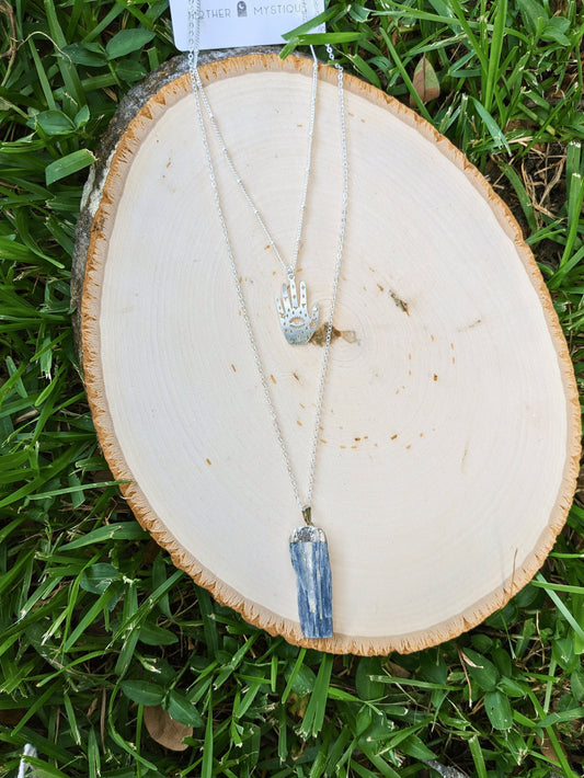 Mystic Blue Kyanite Duo Necklace with raw Brazilian Blue Kyanite pendant and mystic hand charm – Mother Mystique Jewelry