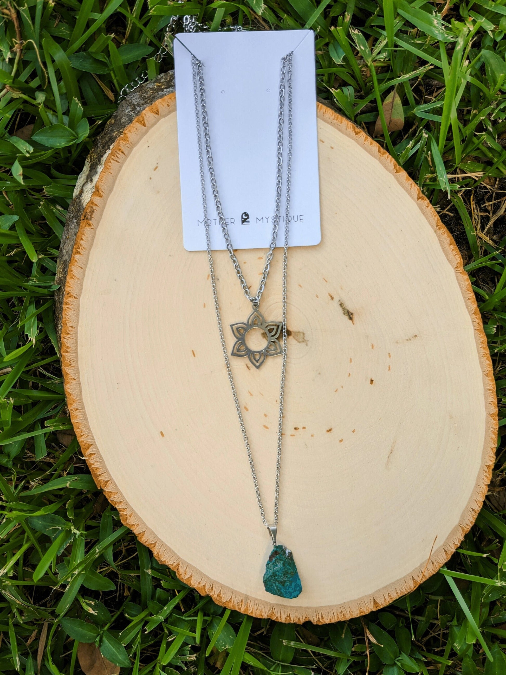 Chrysocolla Floral Twin Necklace with raw Brazilian Chrysocolla pendant and flower charm on tarnish-resistant stainless steel chains – Mother Mystique Jewelry