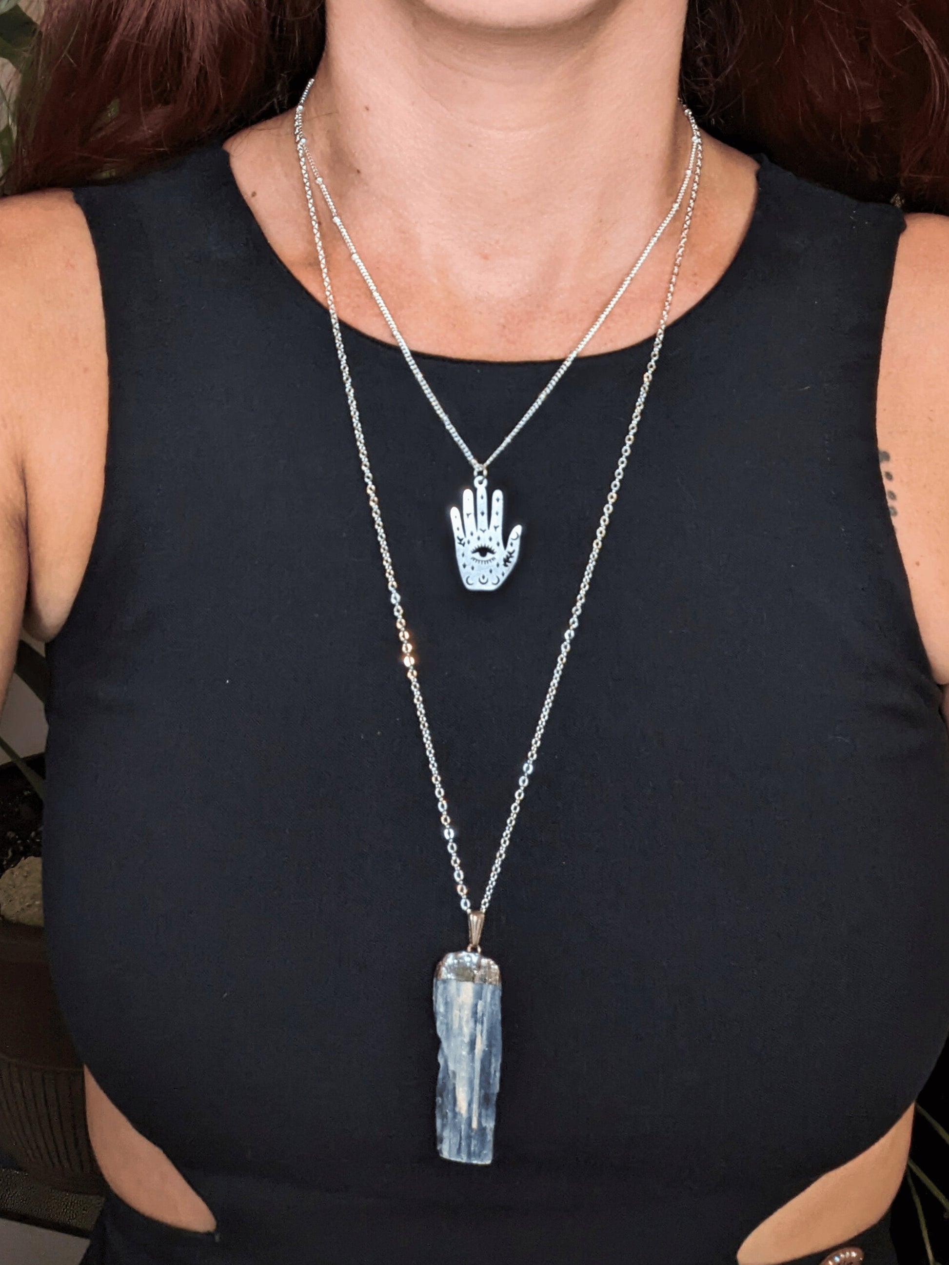 Mystic Blue Kyanite Duo Necklace with raw Brazilian Blue Kyanite pendant and mystic hand charm โ Mother Mystique Jewelry