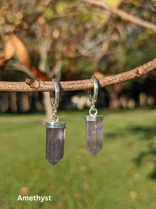 Earth’s Edge Earrings with silver-toned hoops and pointed Brazilian crystal pendants — available in Amazonite, Amethyst, or Rose Quartz – Mother Mystique Jewelry
