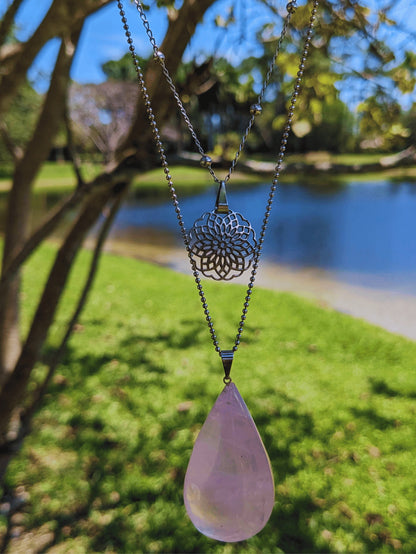 Celestial Twin Necklace with mandala charm and faceted Brazilian gemstone drop – available in blue quartz, rose quartz, or aventurine – Mother Mystique JewelryCelestial Twin Necklace with mandala charm and faceted Brazilian gemstone drop – available in blue quartz, rose quartz, or aventurine – Mother Mystique Jewelry
